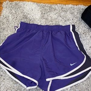 Purple Nike shorts